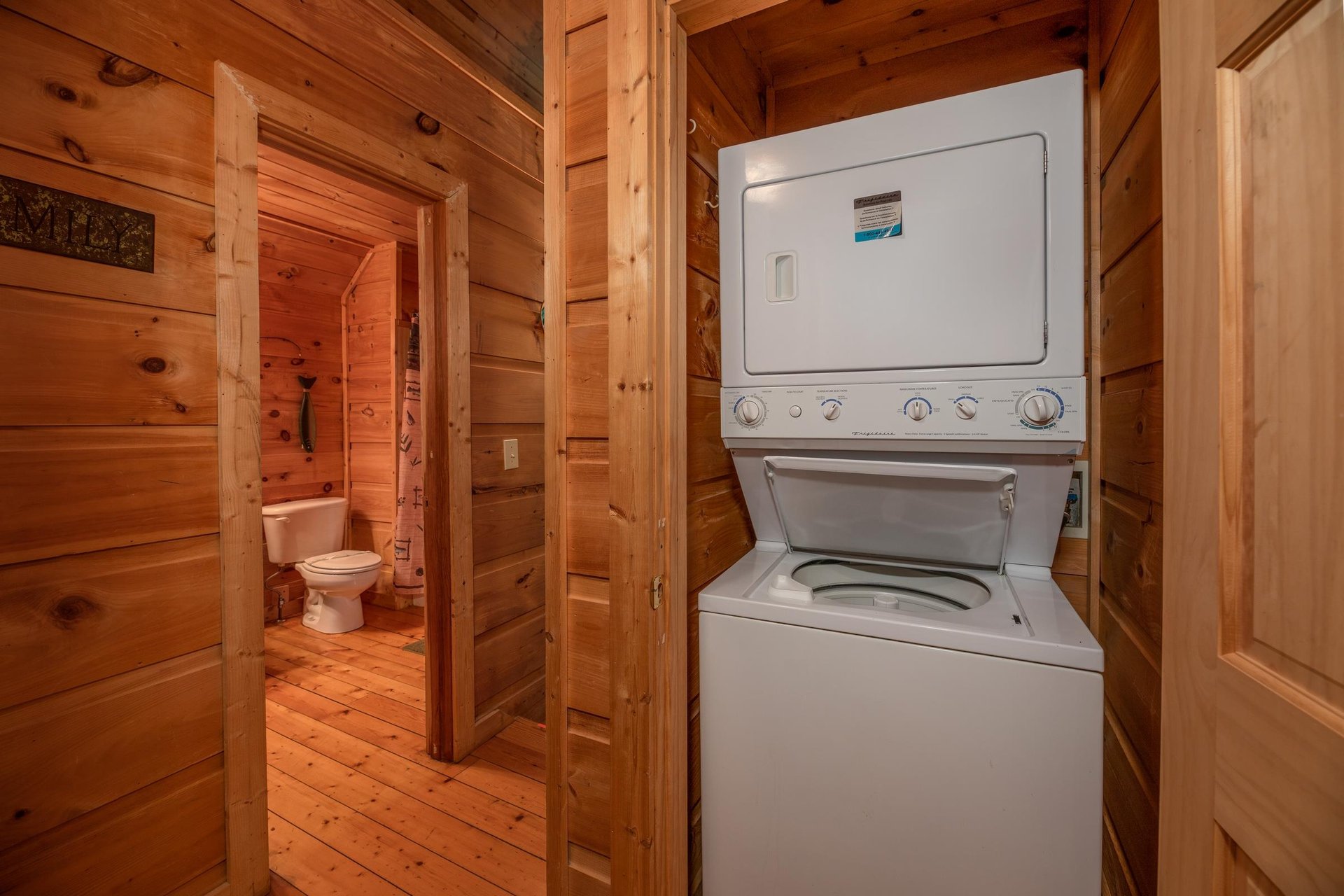 Stacked washer and dyer at Logans Smoky Den, a 2 bedroom cabin rental located in Pigeon Forge