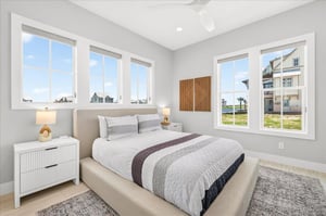 Conveniently located just off the game lounge, this inviting firstfloor queen bedroom offers easy access to the fun while providing a comfortable retreat to unwind and recharge.
