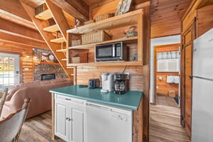 Kitchen cabinets and small appliances at Living on Love, a 2 bedroom cabin rental located in Pigeon Forge
