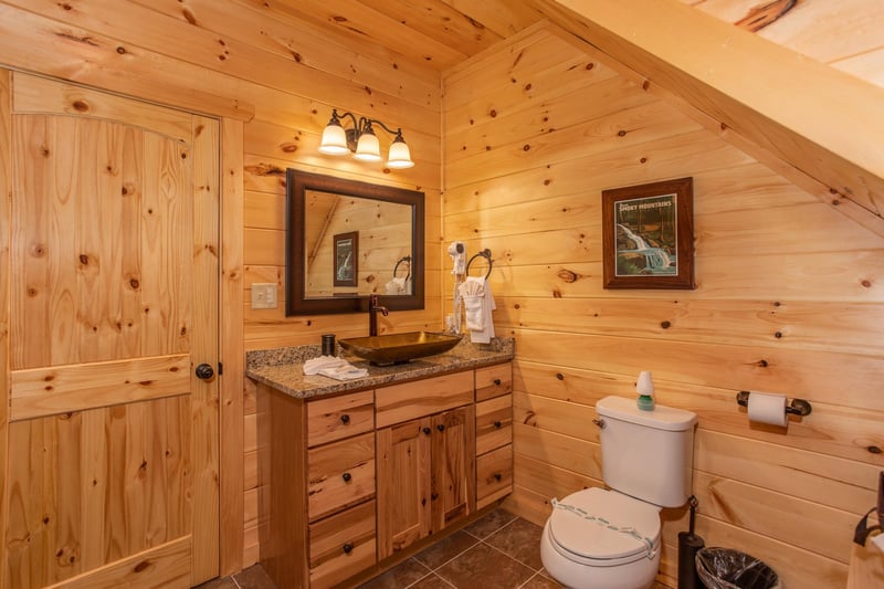 Single vanity sink and toilet