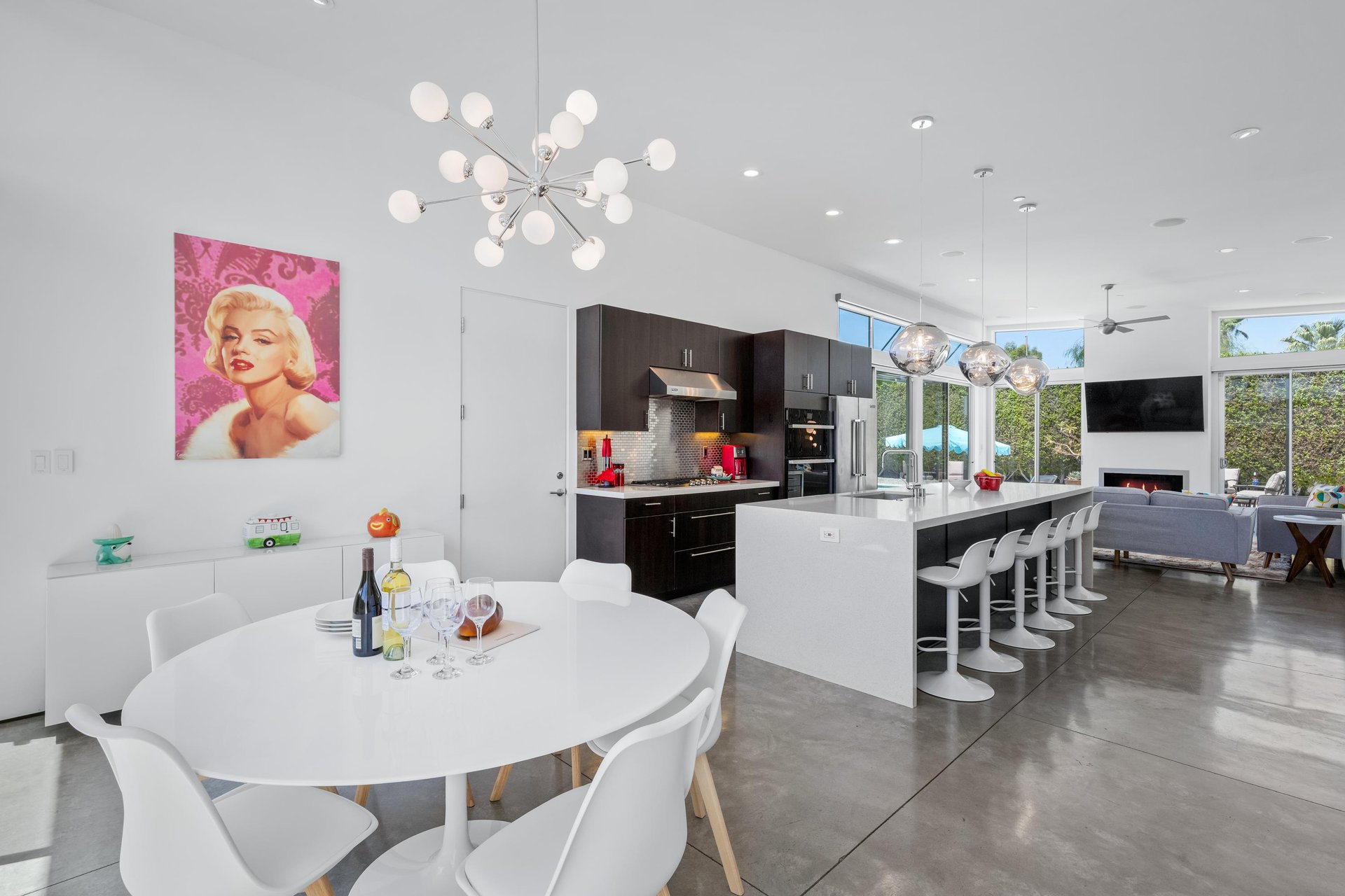 Dining area with table and chairs for 6 guests.