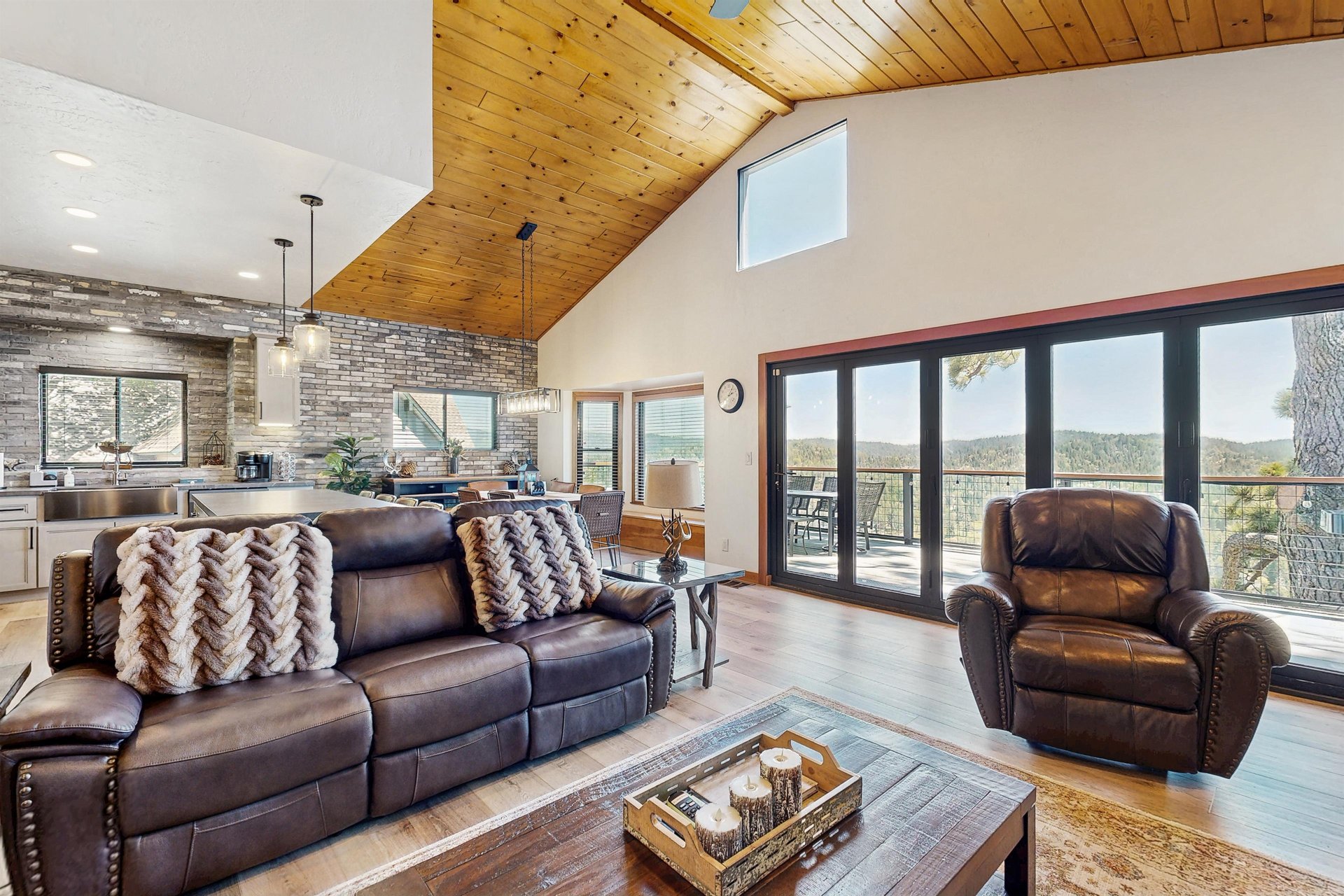 Equipped with a smart TV, fireplace, and openconcept living space.