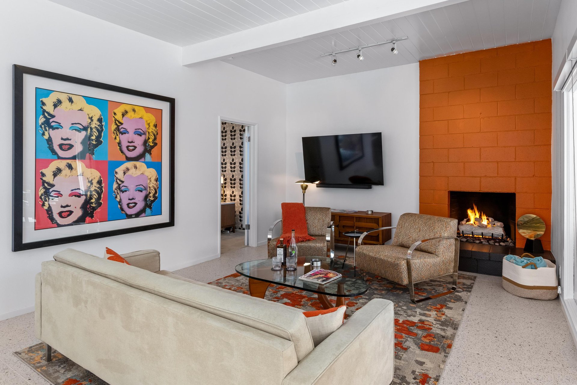 Comfortable midcentury modern furniture with fireplace