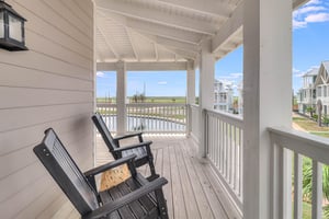 2nd Floor Rear Balcony overlooking lake with bay views