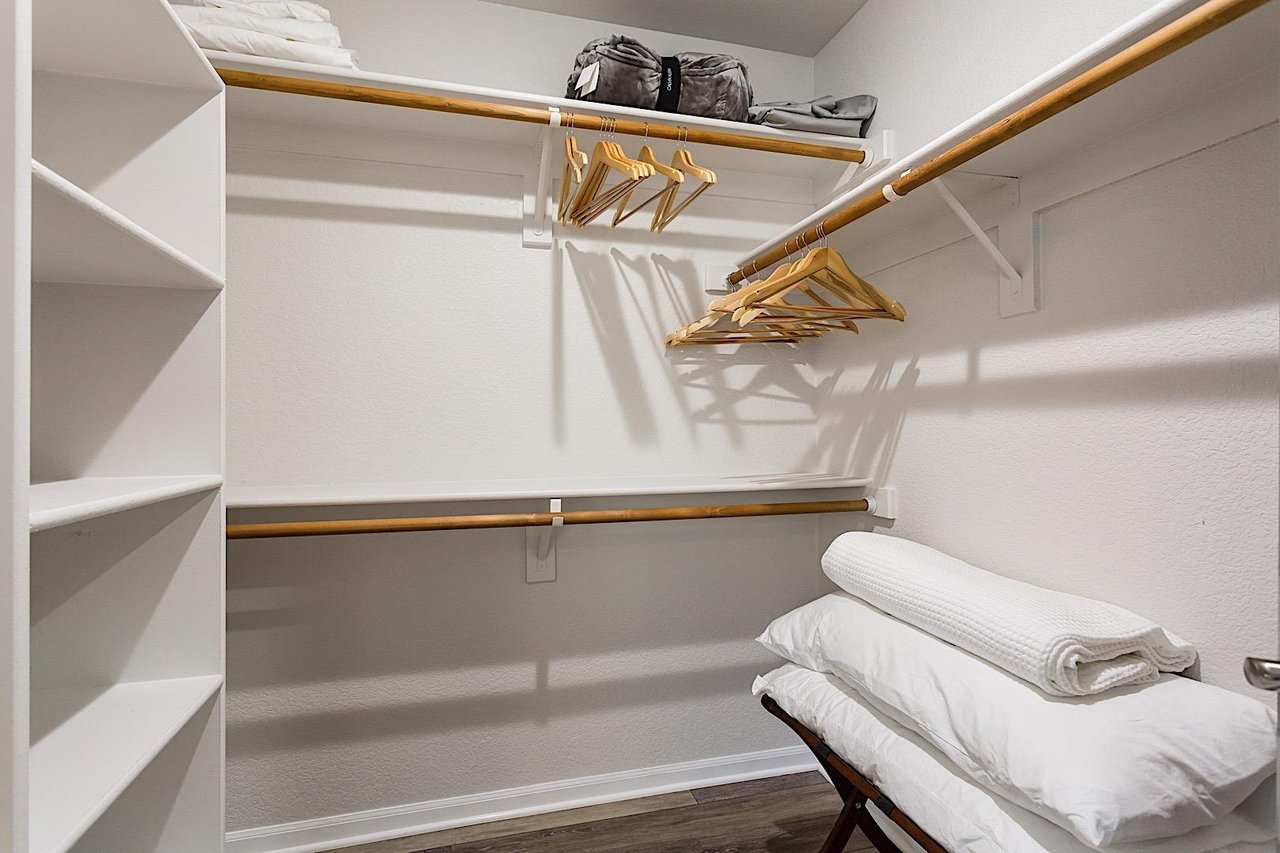 Large Walk in closet with some extra comfortable blankets and pillows available
