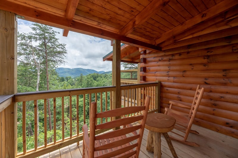 View with outdoor rocking chairs and small table