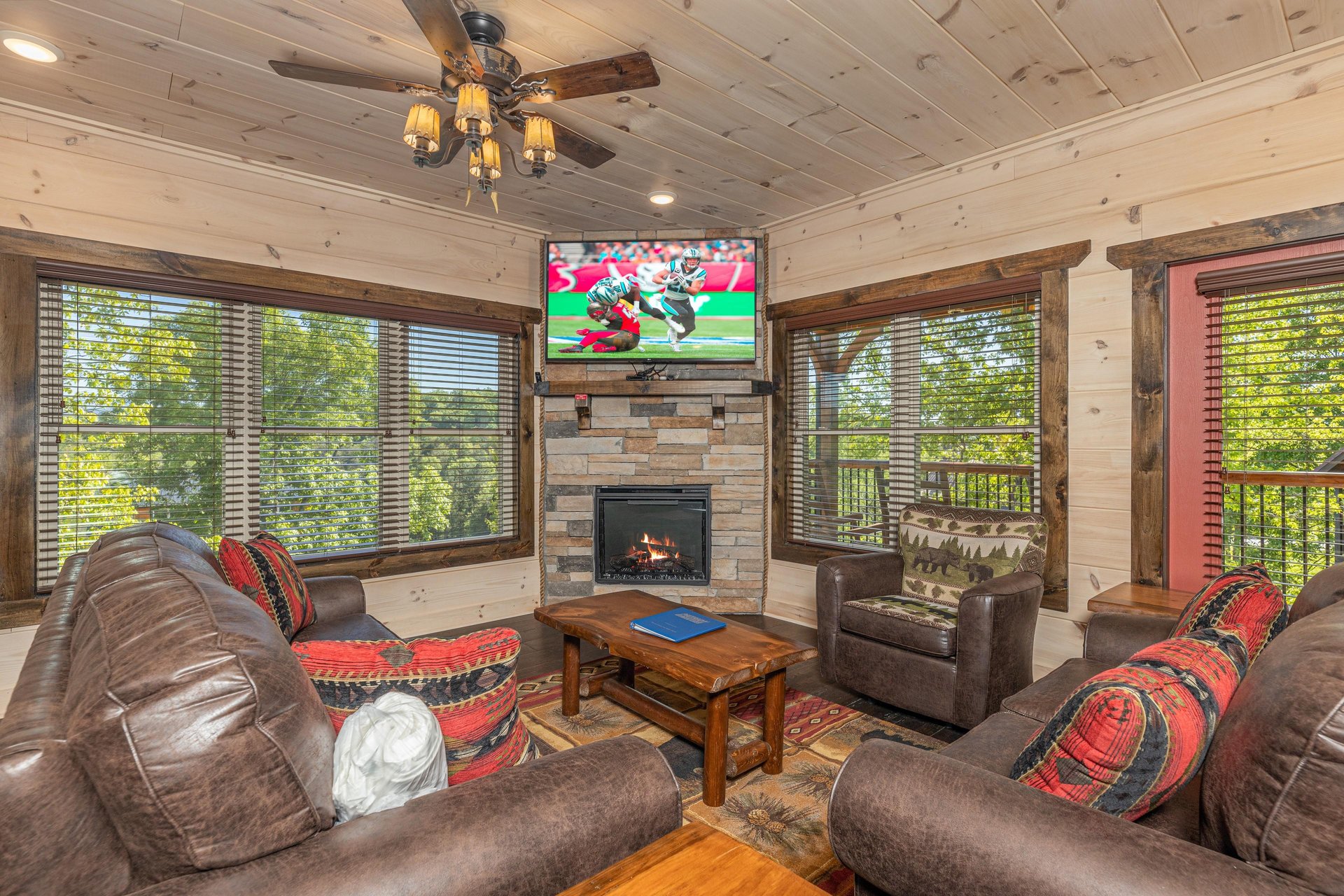 Living room with stone fireplace