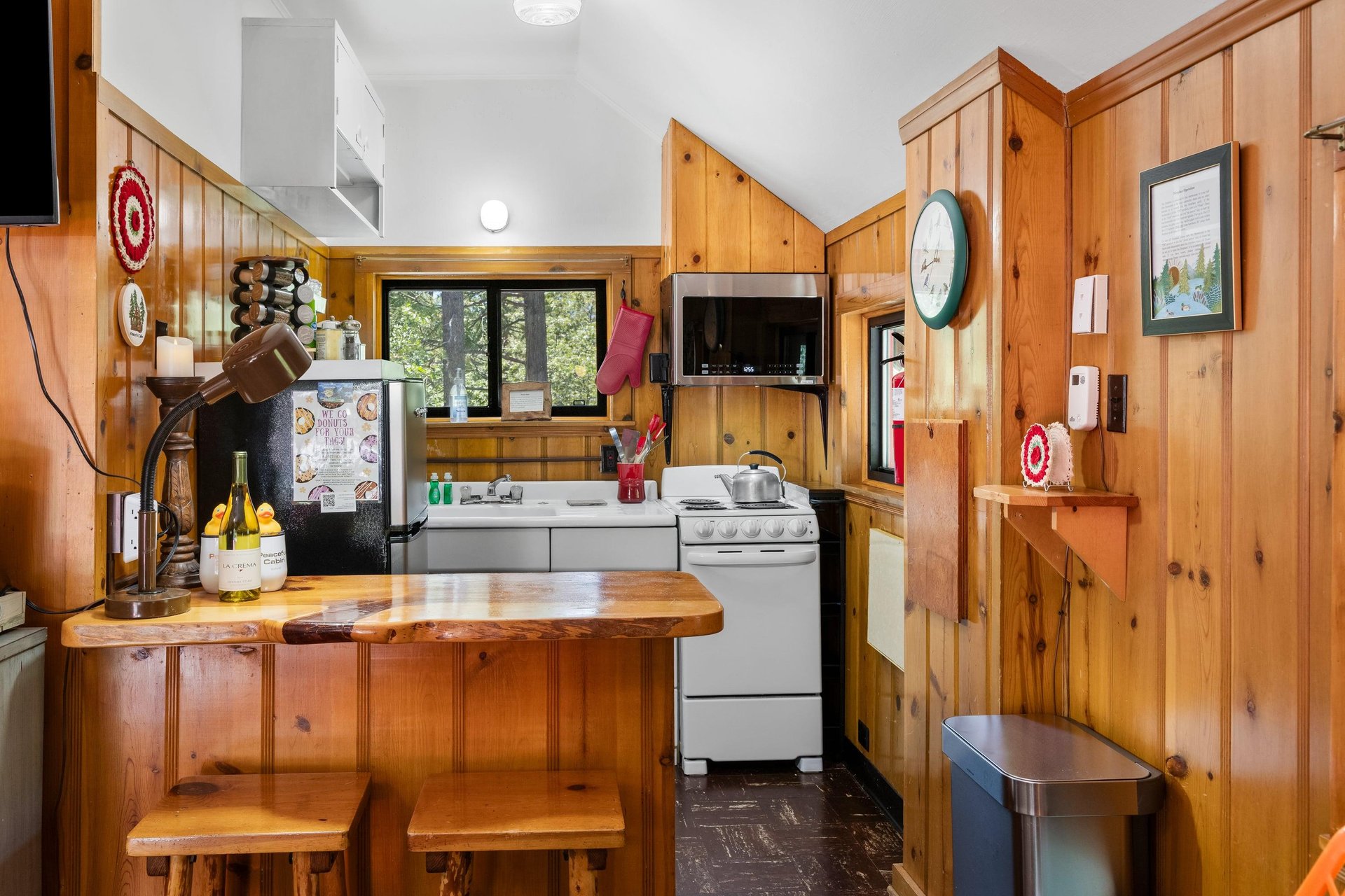 Full size kitchen located next to the sleeping area.