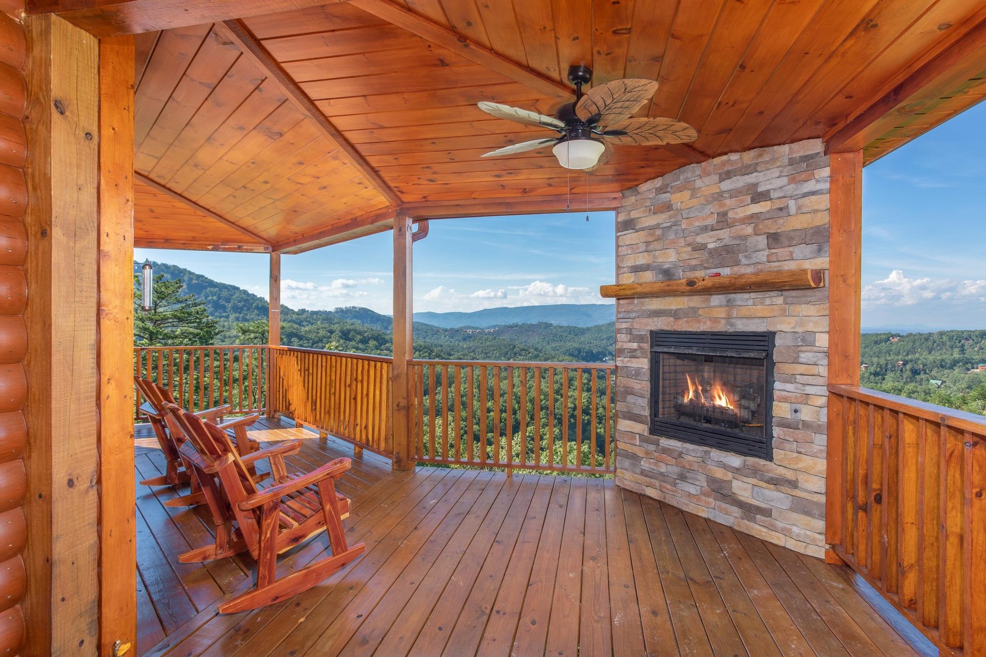 Outdoor fireplace and Rocking Chairs on the Covered Deck