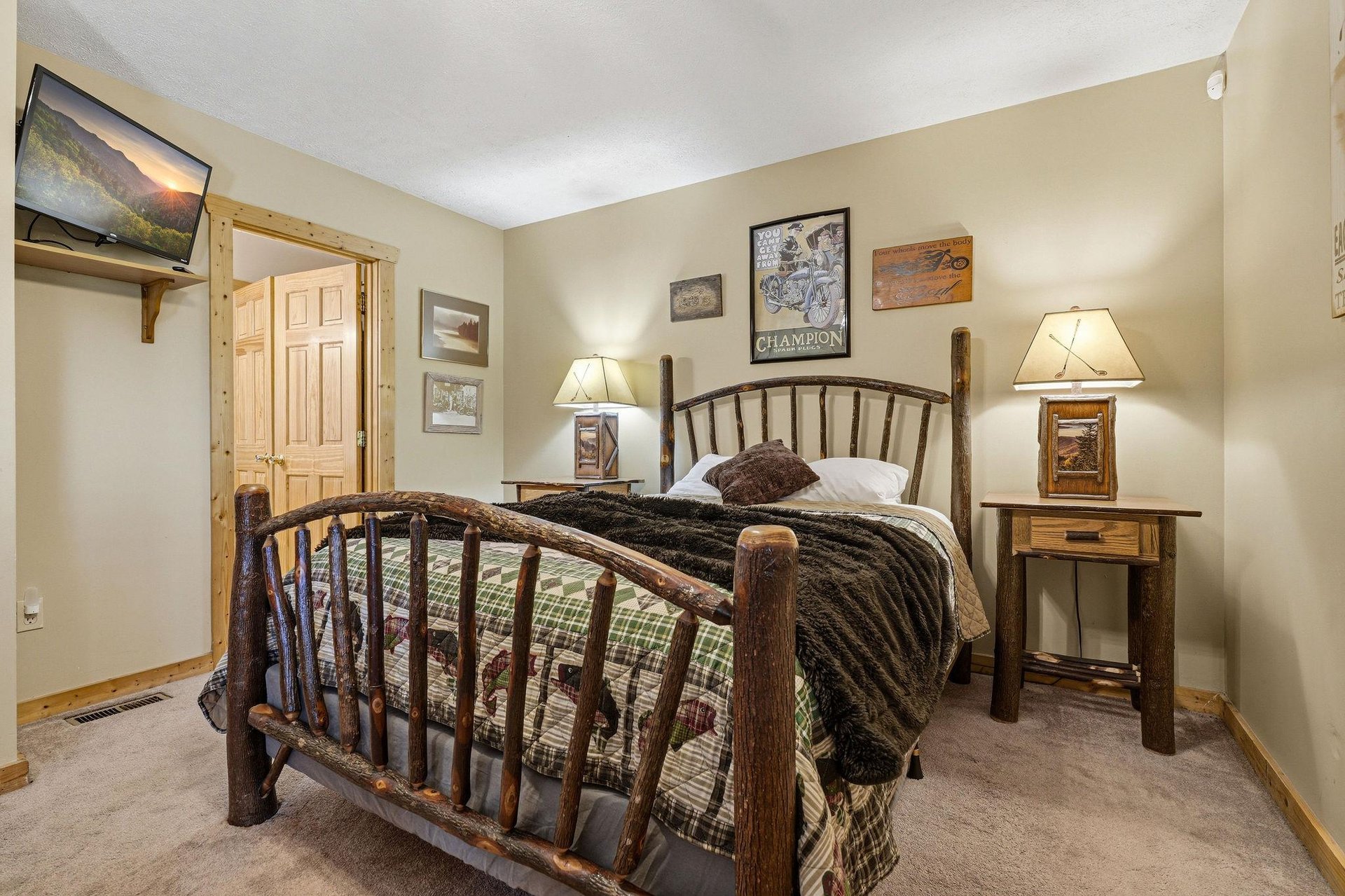 Your cozy retreat awaits with rustic charm and thoughtful touches, from the handcrafted log bed to warm lighting that creates the perfect ambiance for restful nights.