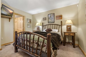 Your cozy retreat awaits with rustic charm and thoughtful touches, from the handcrafted log bed to warm lighting that creates the perfect ambiance for restful nights.