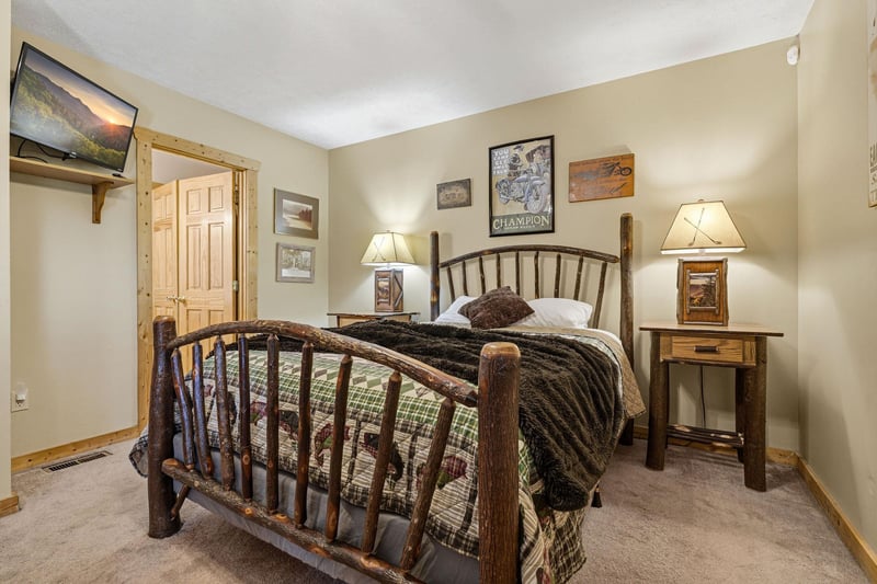 Your cozy retreat awaits with rustic charm and thoughtful touches, from the handcrafted log bed to warm lighting that creates the perfect ambiance for restful nights.