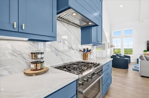 The kitchen features a large gas range and oven, making it easy to prepare delicious meals for your entire group.