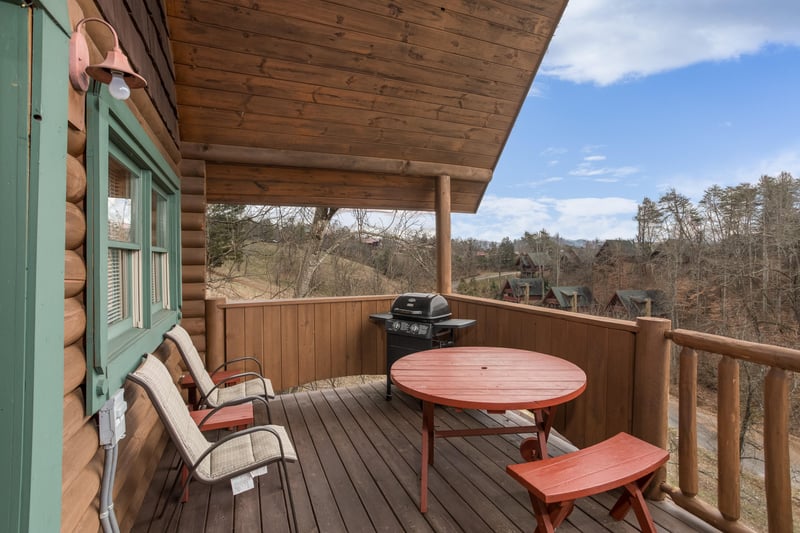 Deck seating at Hanky Panky, a 1bedroom cabin rental located in Pigeon Forge