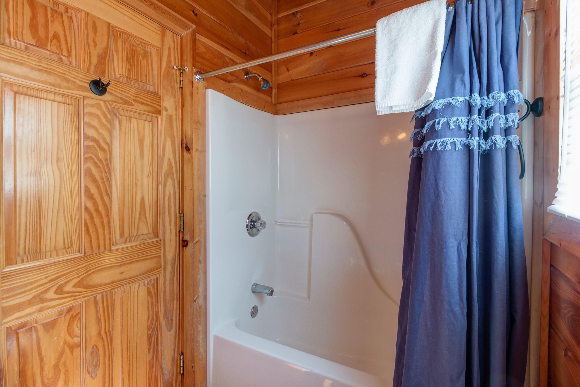 Bathroom with a tub and shower at EllaVation, a 3 bedroom cabin rental located in Gatlinburg