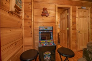 Multigame arcade at Logans Smoky Den, a 2 bedroom cabin rental located in Pigeon Forge