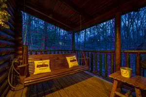 A Lovers Secret Porch Swing at Night