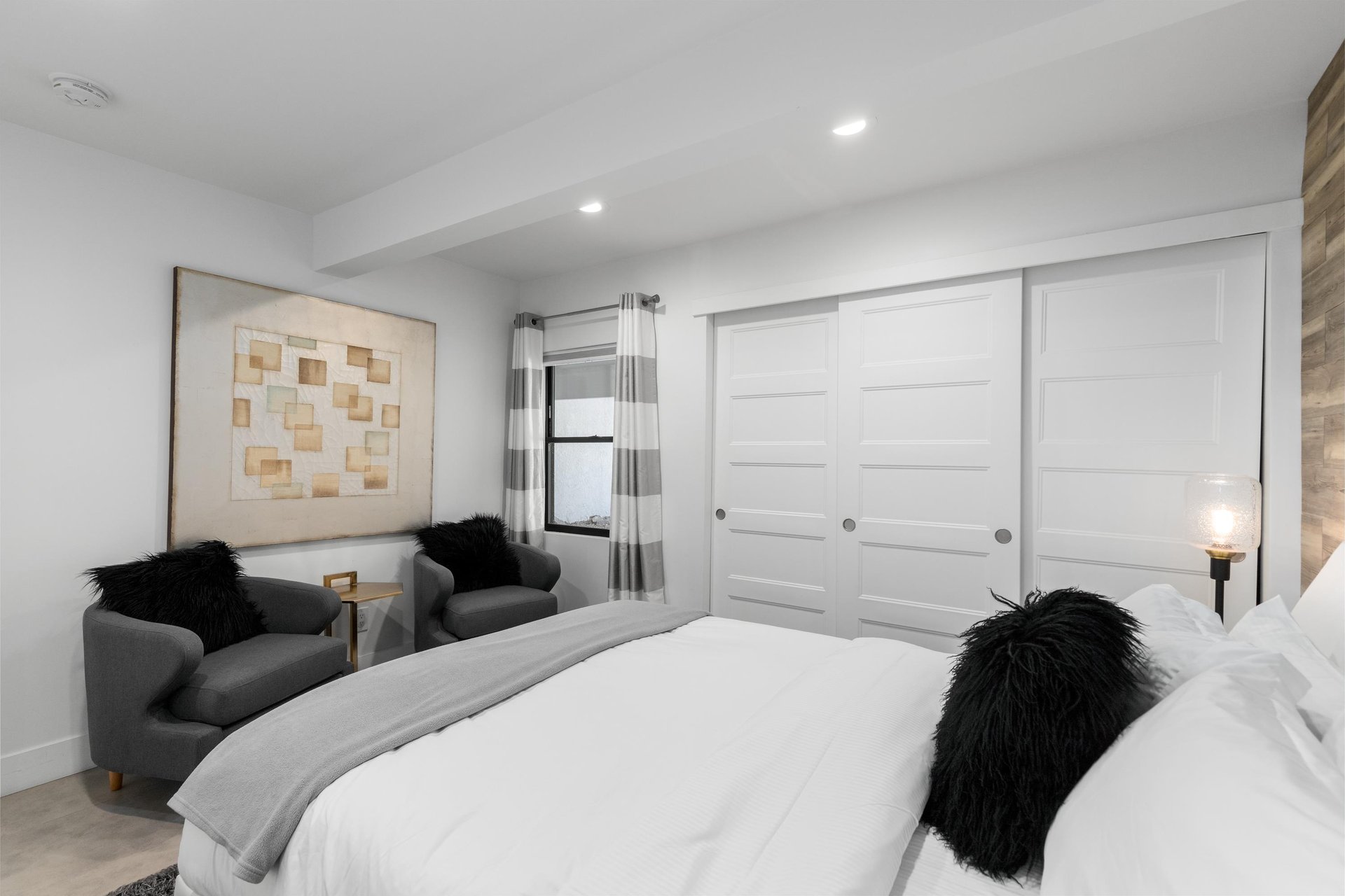 Seating area and view of closet.