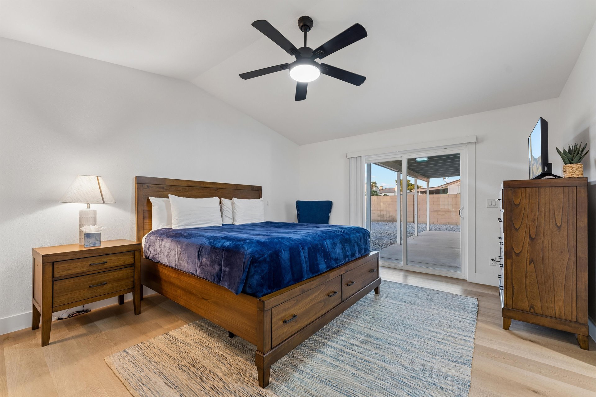 King size bed, flat screen TV, patio access, and ensuite bathroom.