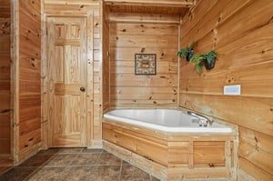 Soak in your private cabin bathtub surrounded by warm wood walls and rustic charm for the perfect mountain retreat.