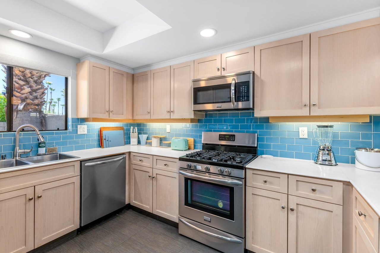 Stainless steel appliances, plenty of counter space, and cooking essentials.
