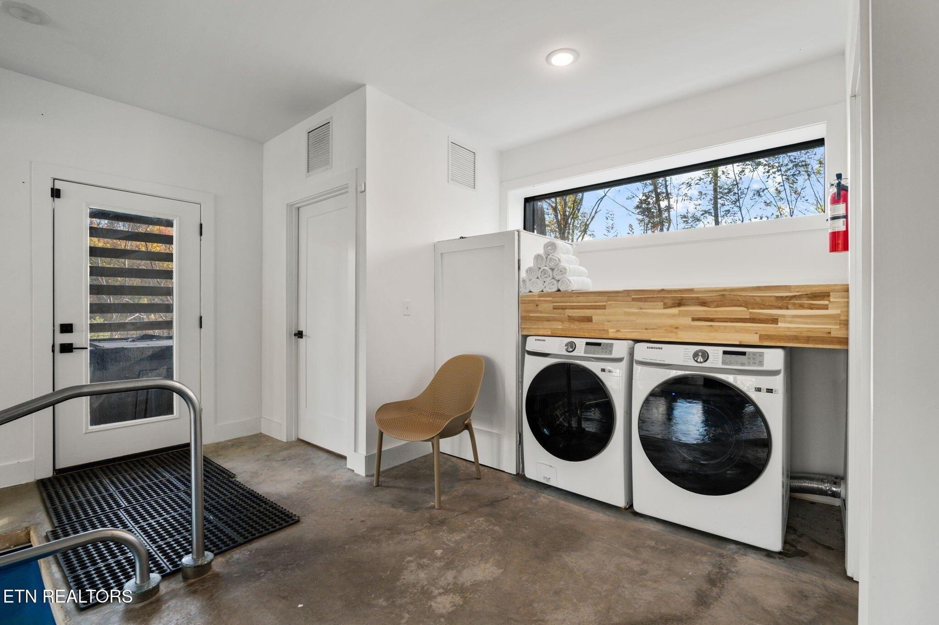 Step inside to a bright entry with inunit laundry. Natural light streams through the windows, making this welcoming space as functional as it is inviting.