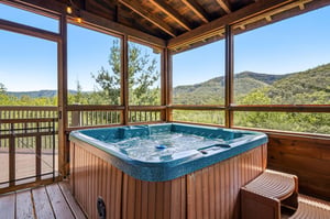 Soak in your private hot tub while gazing at stunning mountain views stretching across the horizon—a perfect retreat after a day of adventure.