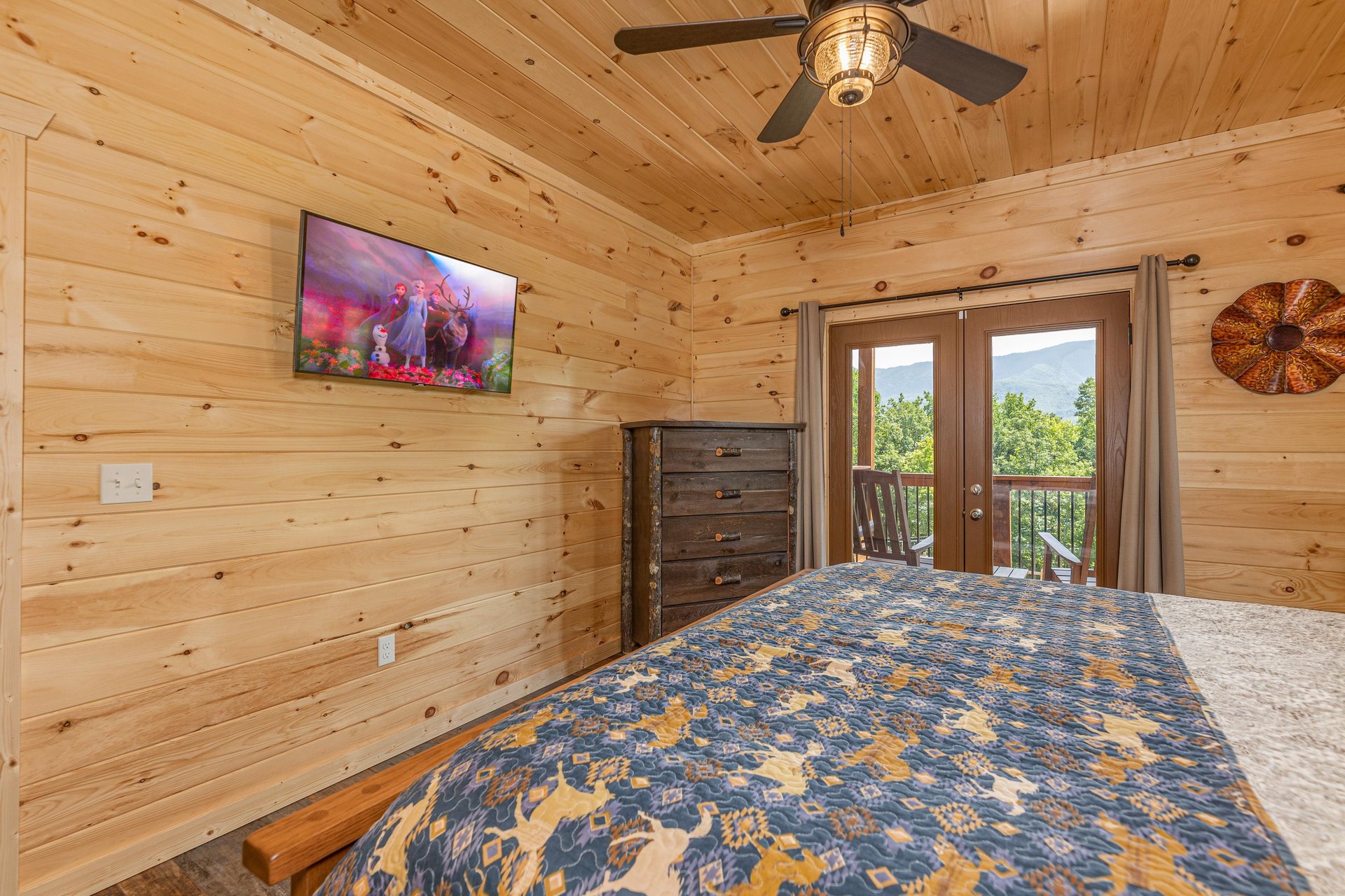 King bed with dresser and tv