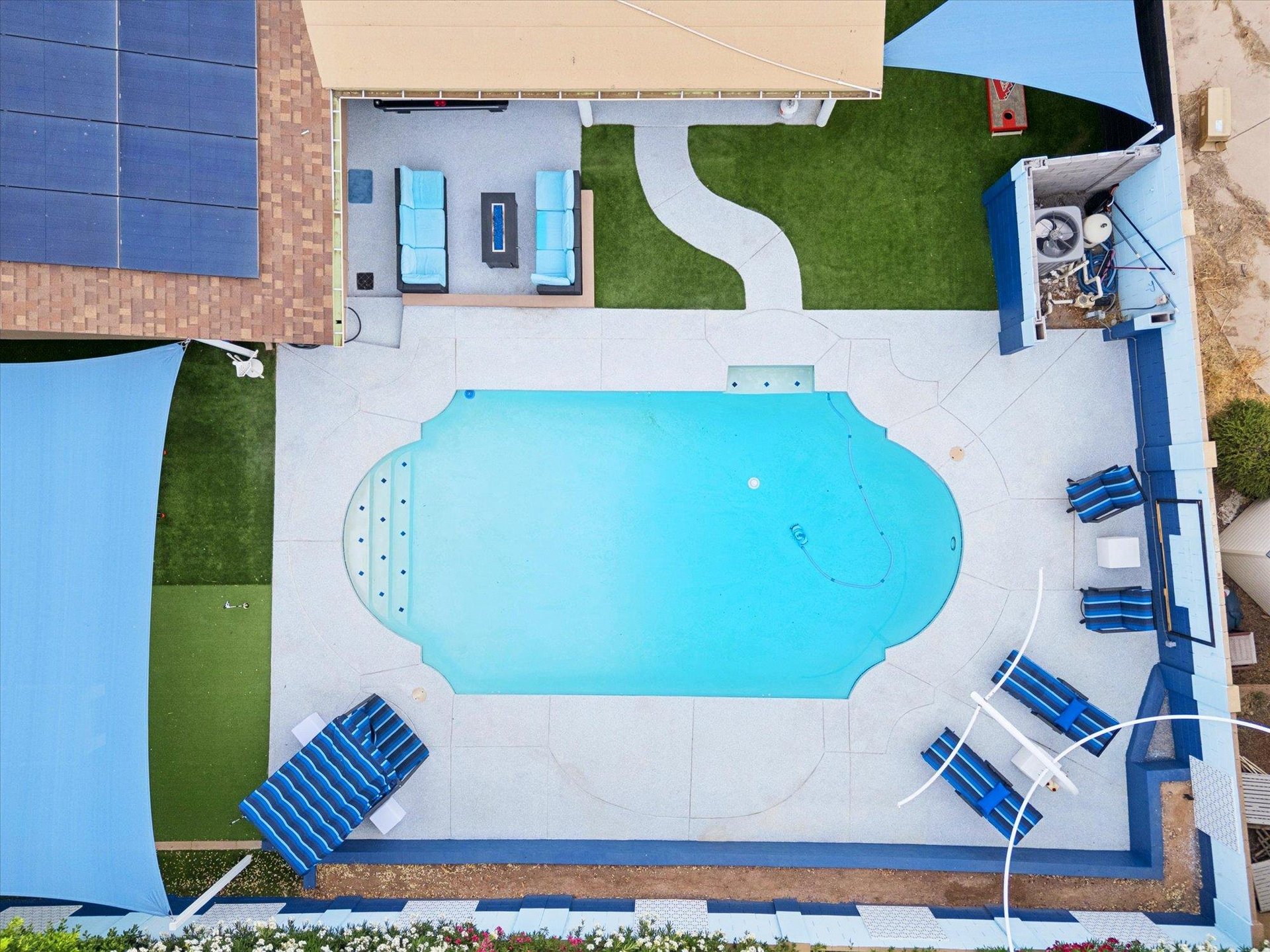 Aerial view of backyard area and private pool.