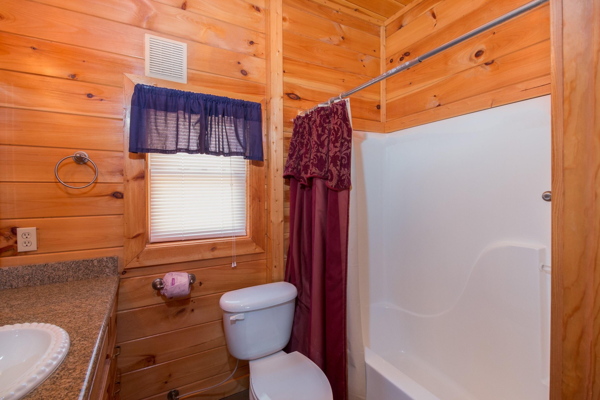 Bathroom with a tub and shower at EllaVation, a 3 bedroom cabin rental located in Gatlinburg