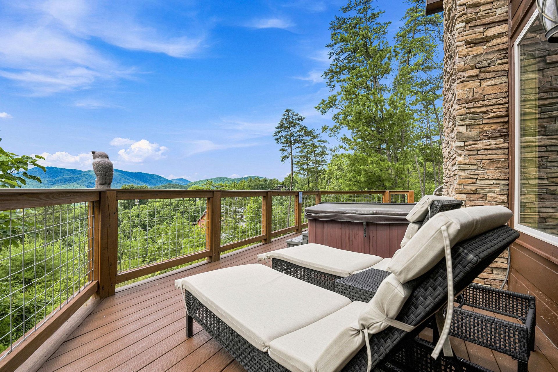 Unwind on your private deck with breathtaking mountain views. Soak in the hot tub, stretch out on the lounge chairs, and breathe in the fresh air.
