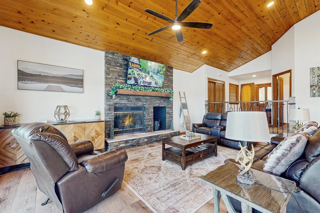 A 3 bedroom, 2.5 bathroom mountain retreat with beautiful views, multiple decks, and modern appliances.