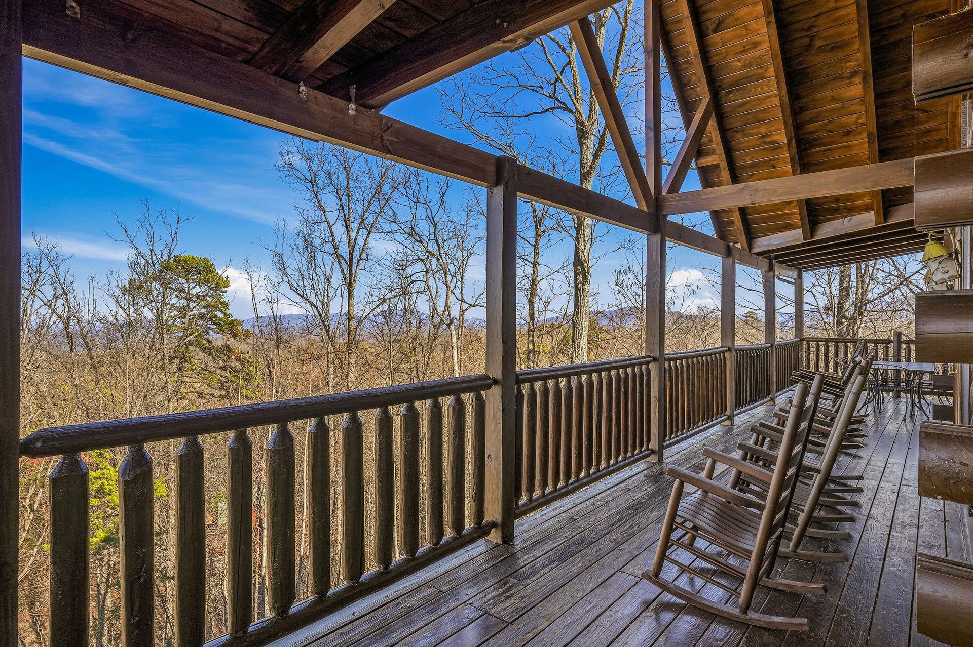 Your private covered porch offers sweeping mountain views where you can rock away peaceful mornings with coffee and watch stunning sunsets.