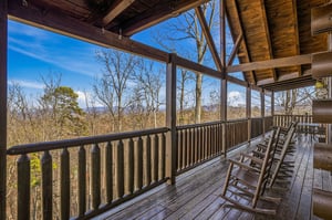 Your private covered porch offers sweeping mountain views where you can rock away peaceful mornings with coffee and watch stunning sunsets.