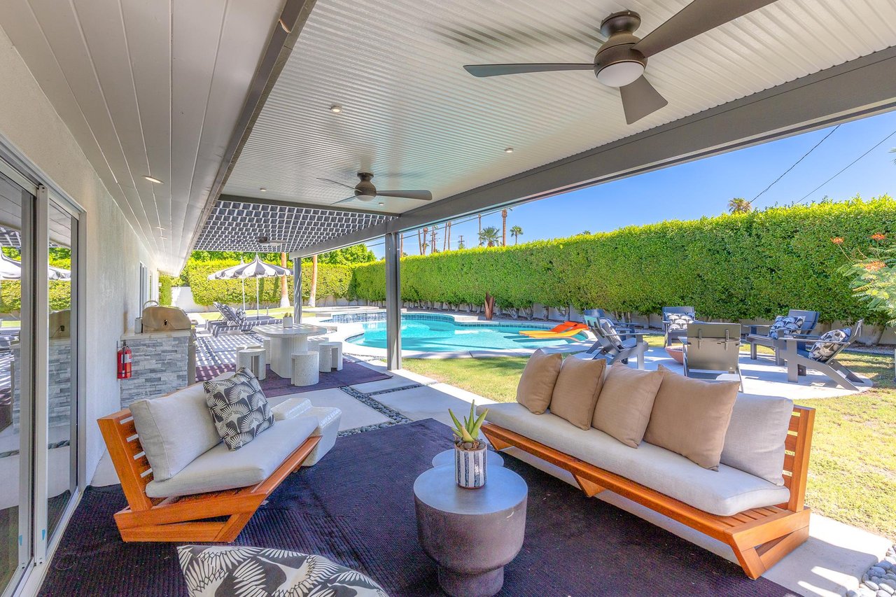 Covered patio make enjoying the pool comfortable