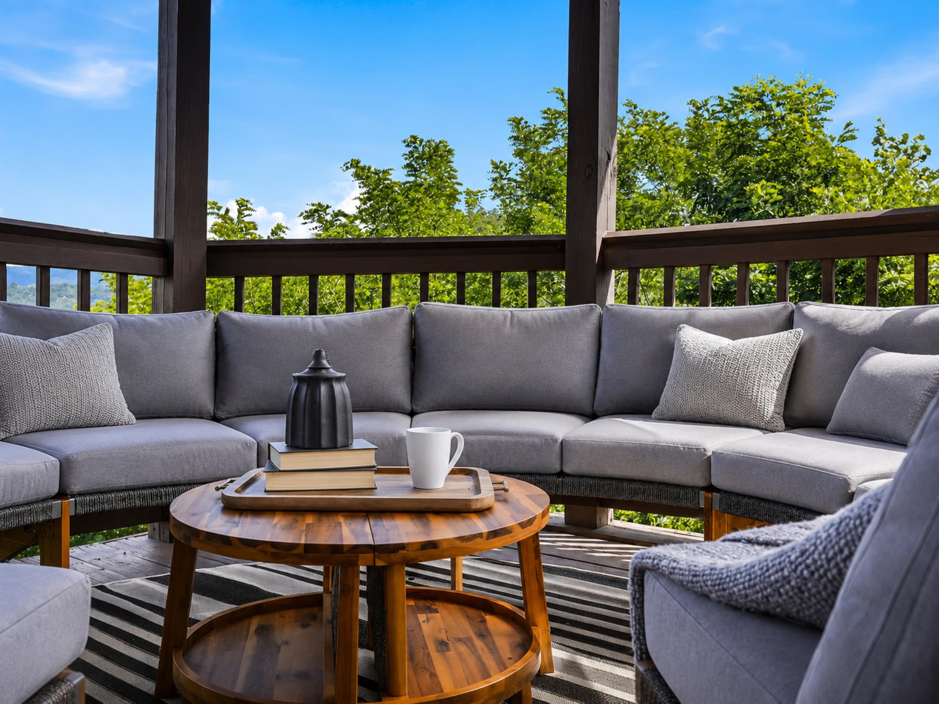 Relax on your private balcony with plush seating and peaceful treetop views—the perfect retreat for morning coffee or evening conversation.