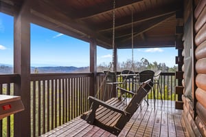 Sway gently in your private porch swing while soaking up breathtaking mountain views and crisp morning air.