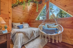 Queen bed and hanging hammock seat