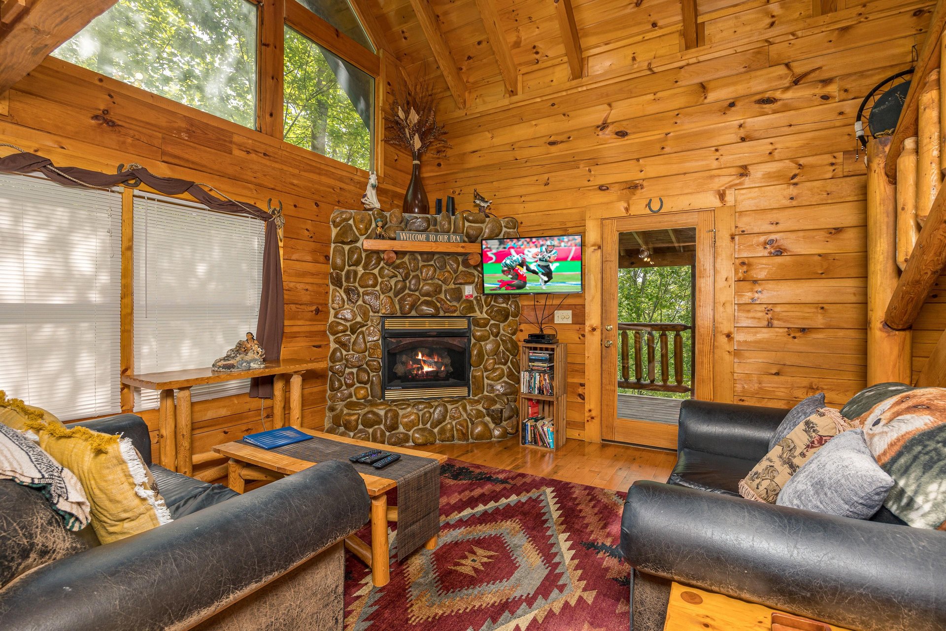 Living room with stone fireplace