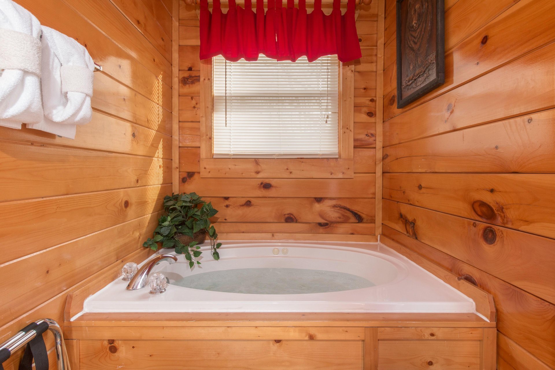 Jacuzzi in a bedroom at Country Bears Getaway, a 3bedroom cabin rental located in Gatlinburg