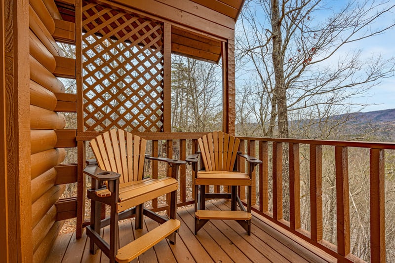 Deck seating for two at Cupids Crossing, a 1 bedroom cabin rental located in Pigeon Forge
