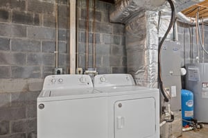 full size washer and dryer in basement
