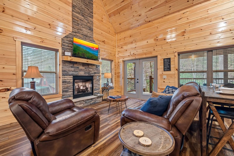 Living room with stone fireplace