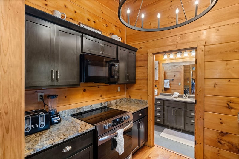 Full kitchen next to bathroom