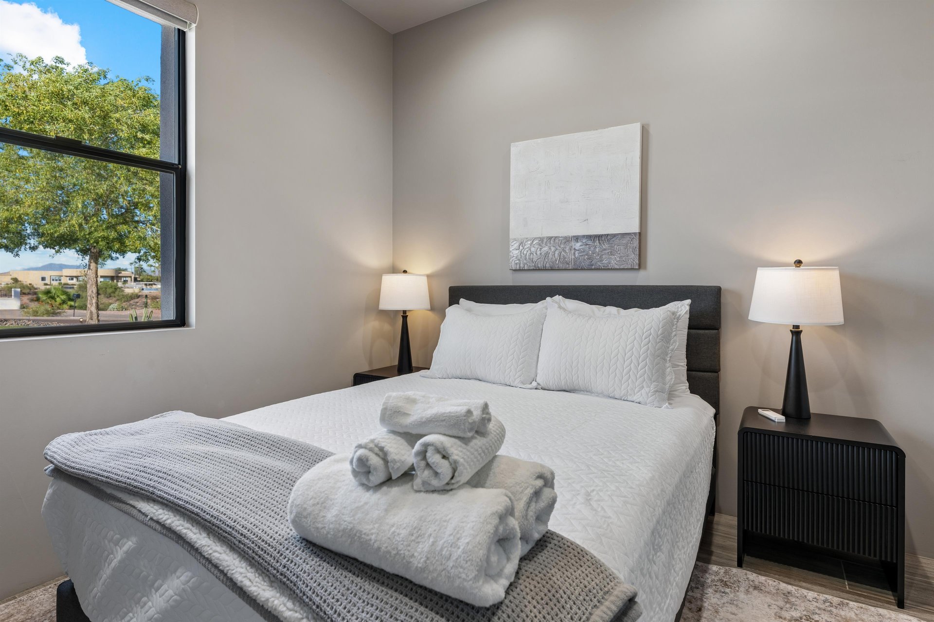 Queen size bed, flatscreen TV, and plenty of closet space.