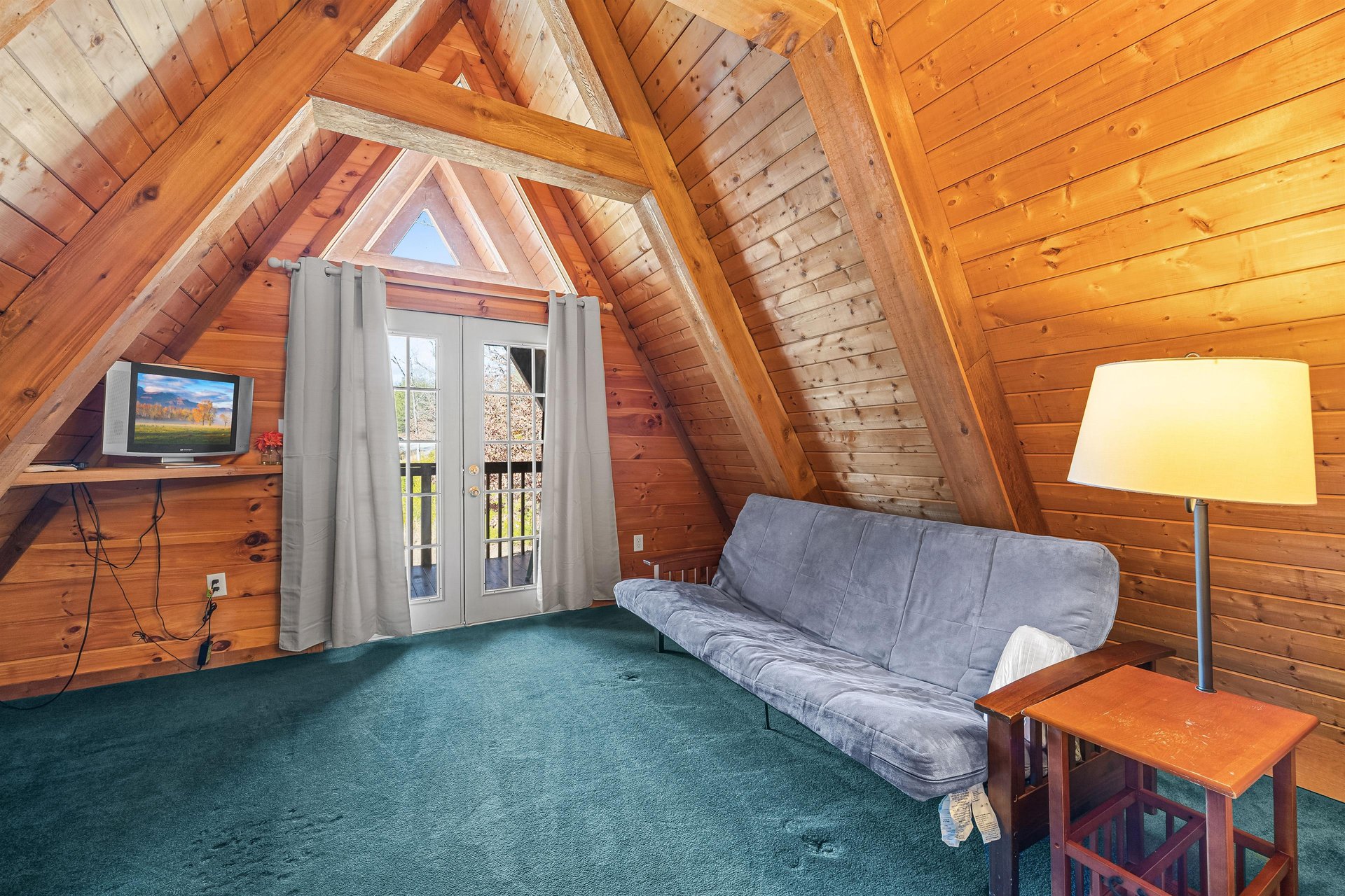 Bathroom with a tub and shower at Living on Love, a 2 bedroom cabin rental located in Pigeon Forge