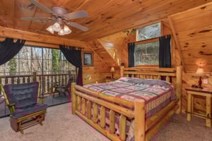 King bedroom in the loft at Hidden Pleasure, a 1bedroom cabin rental located in Gatlinburg