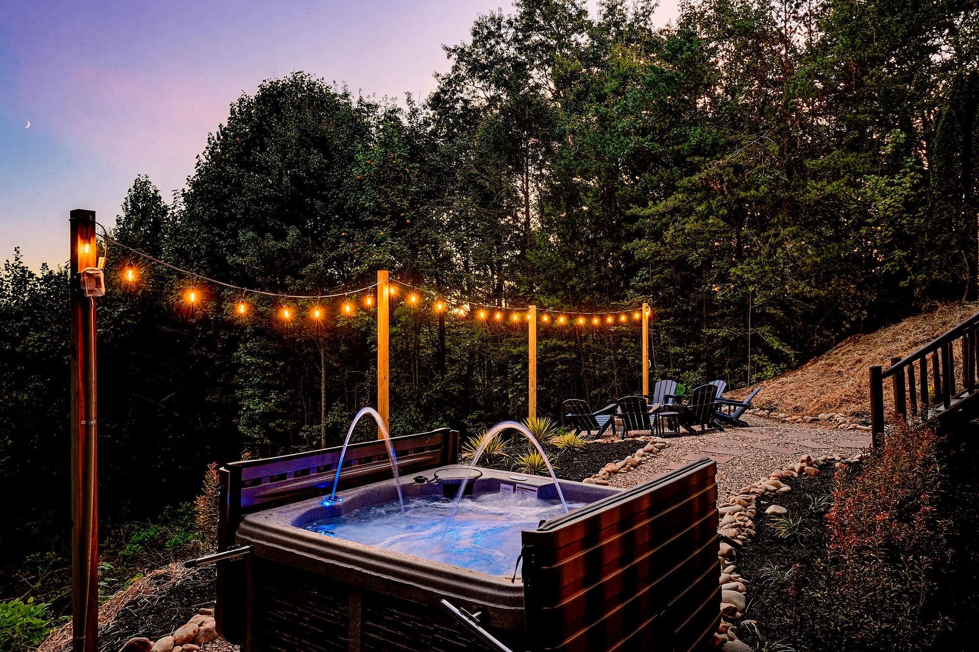 Soak under the stars in your private hot tub, surrounded by trees and soft string lights. Perfect for unwinding after a day of exploring.