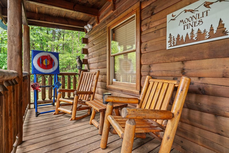 front porch seating with axe throwing game