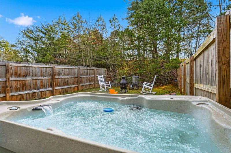Soak your cares away in your private hot tub surrounded by towering trees and peaceful woodland views.